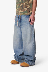 Mega Baggy Waxed Denim - Medium Blue
