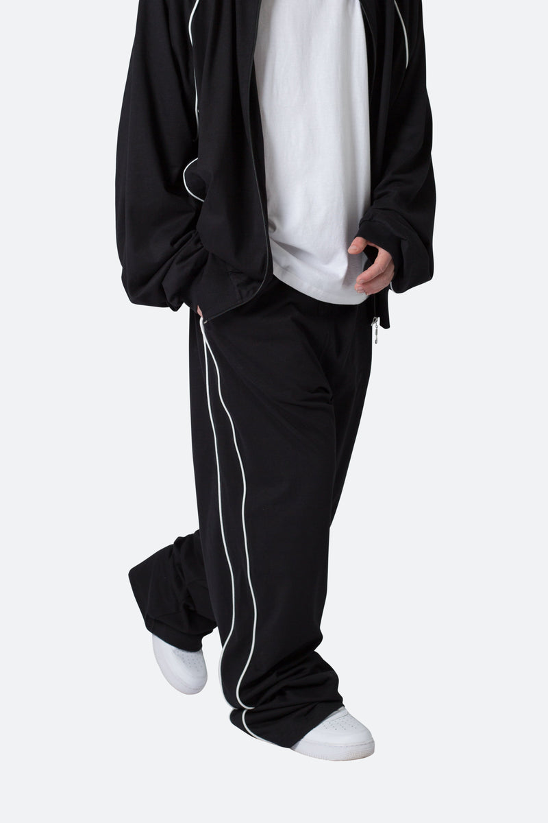 Mnml la track pants, Men's Fashion, Bottoms, Trousers on Carousell