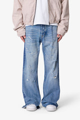 Paneled Distressed Kick Flare Denim - Blue