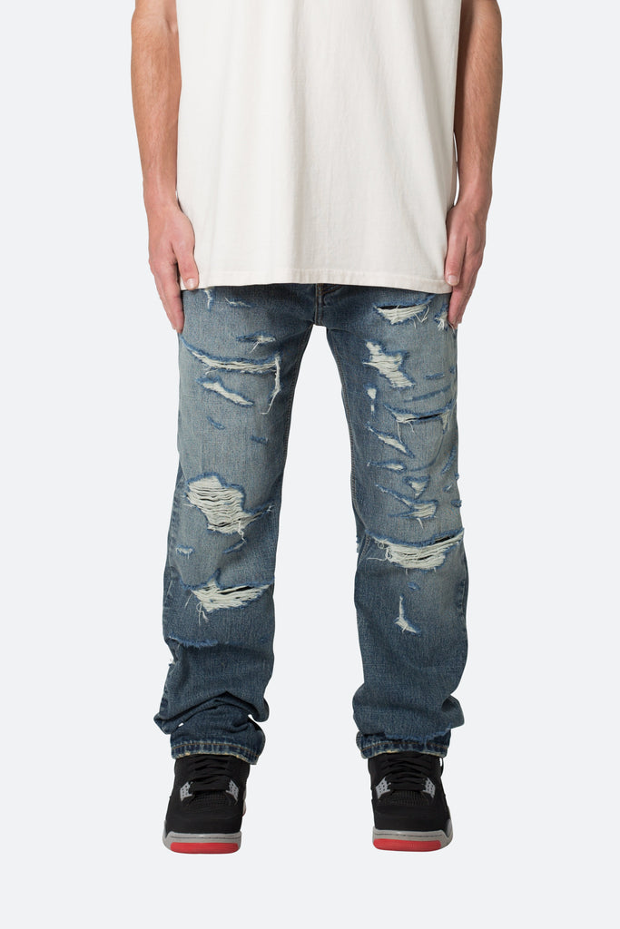 V567 Baggy Destroyed Denim - Blue | mnml | shop now